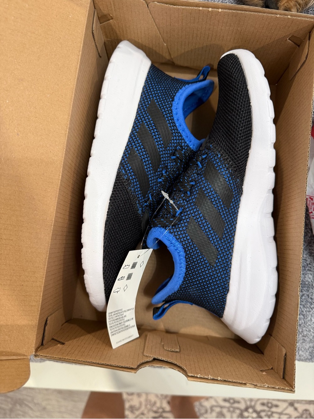 adidas Kids Black and Blue Knit Slip-On Sneakers